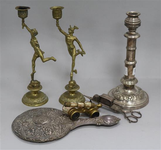 A pair of brass figural candlesticks, opera glasses, plated candlesticks and snuffers and a silver dressing mirror